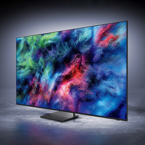 Samsung Micro RGB 4K TV displaying vivid colour spectrum artwork on a pedestal stand